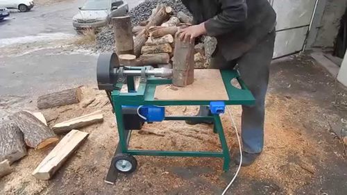 Варианты полезных самоделок из старой стиральной машины drovokol_s_dvigatelem_ot_stiralnoj_mashiny_1